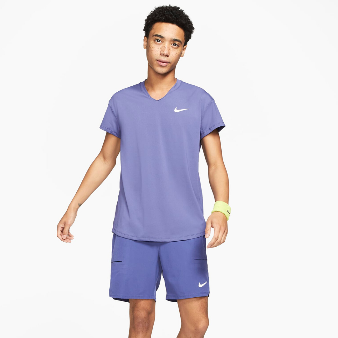 purple and blue nike shirt